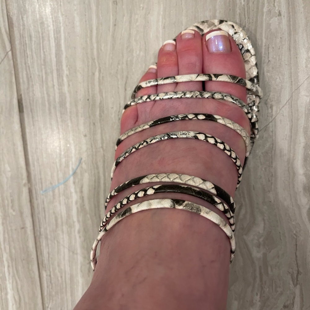 Jennifer Lopez strappy snakeskin sandals